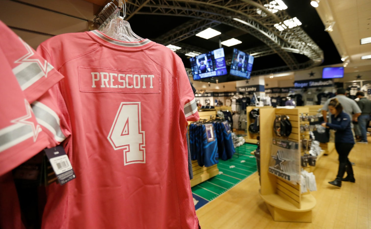 A Dallas Cowboys quarterback Dak Prescott jersey is on display for sale at the Dallas...