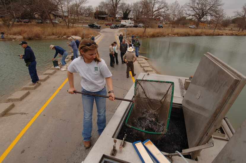 Texas Parks and Wildlife Department hatchery workers will stock more than 337,000 rainbow...