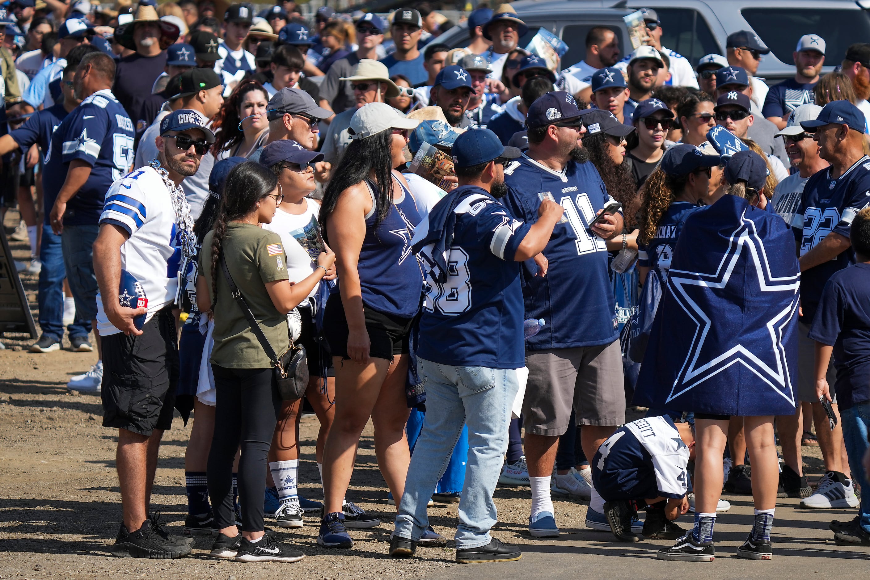 Photos: Kick back and celebrate! Dallas Cowboys Cheerleaders perform at  training camp opening ceremonies