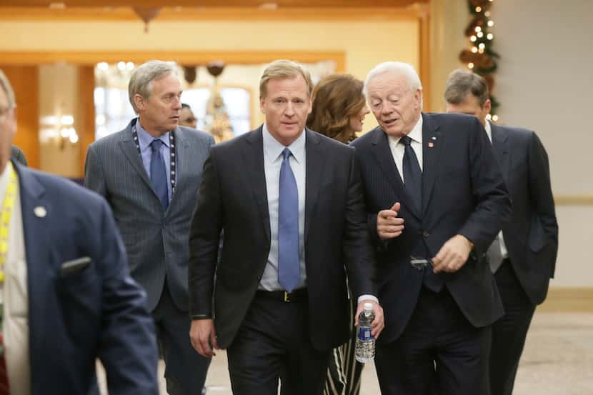 NLF Commissioner Roger Goodell, left, chats with Dallas Cowboys owner Jerry Jones during the...