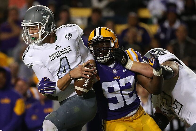 BATON ROUGE, LA - OCTOBER 03: Brogan Roback #4 of the Eastern Michigan Eagles is sacked by...