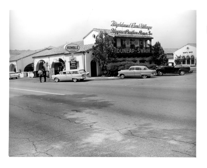 The site of the 3-story building with the club on top was originally a service station.