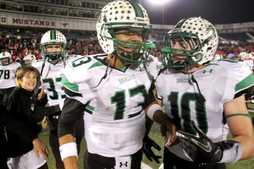 Southlake Carroll quarterback Kenny Hill (13) scored two touchdowns in 21 seconds to lead...