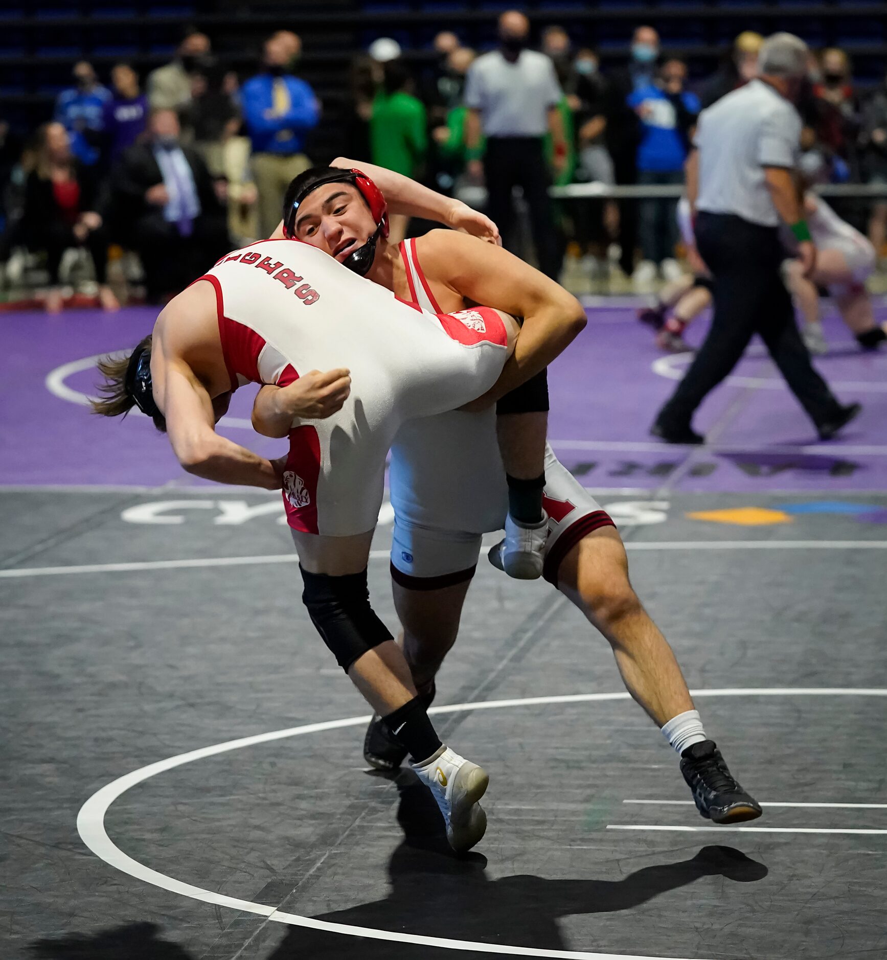 Kade Moore of Allen wrestles Jackson Crandall of Katy for the 6A boys 126-pound championship...