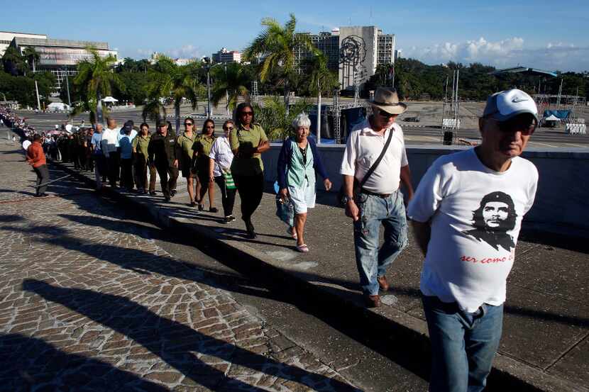 People wait in line to pay their final respects to the late Fidel Castro, in Havana, Cuba,...