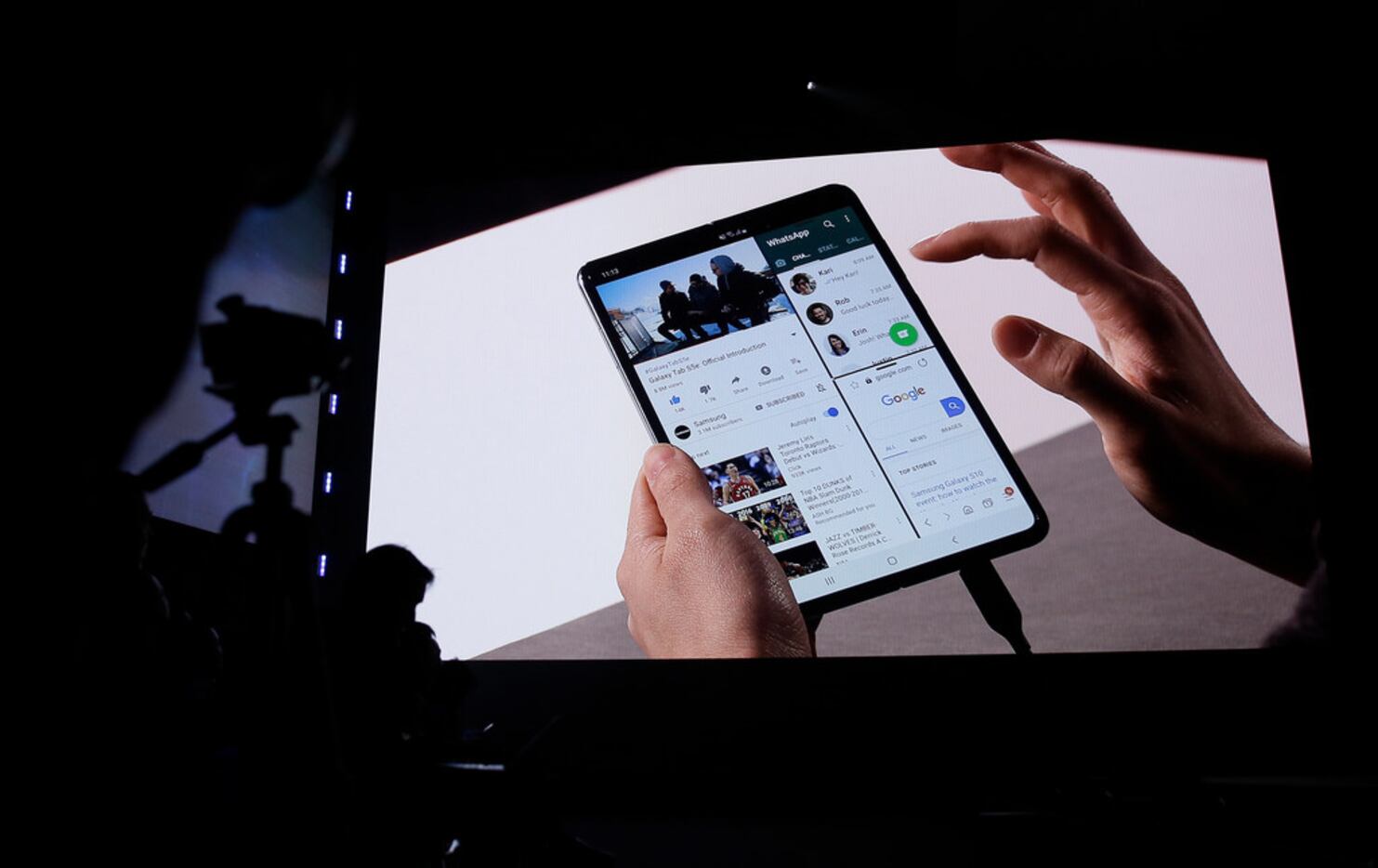 Features of the new Samsung Galaxy Fold smartphone are displayed during an event Wednesday,...