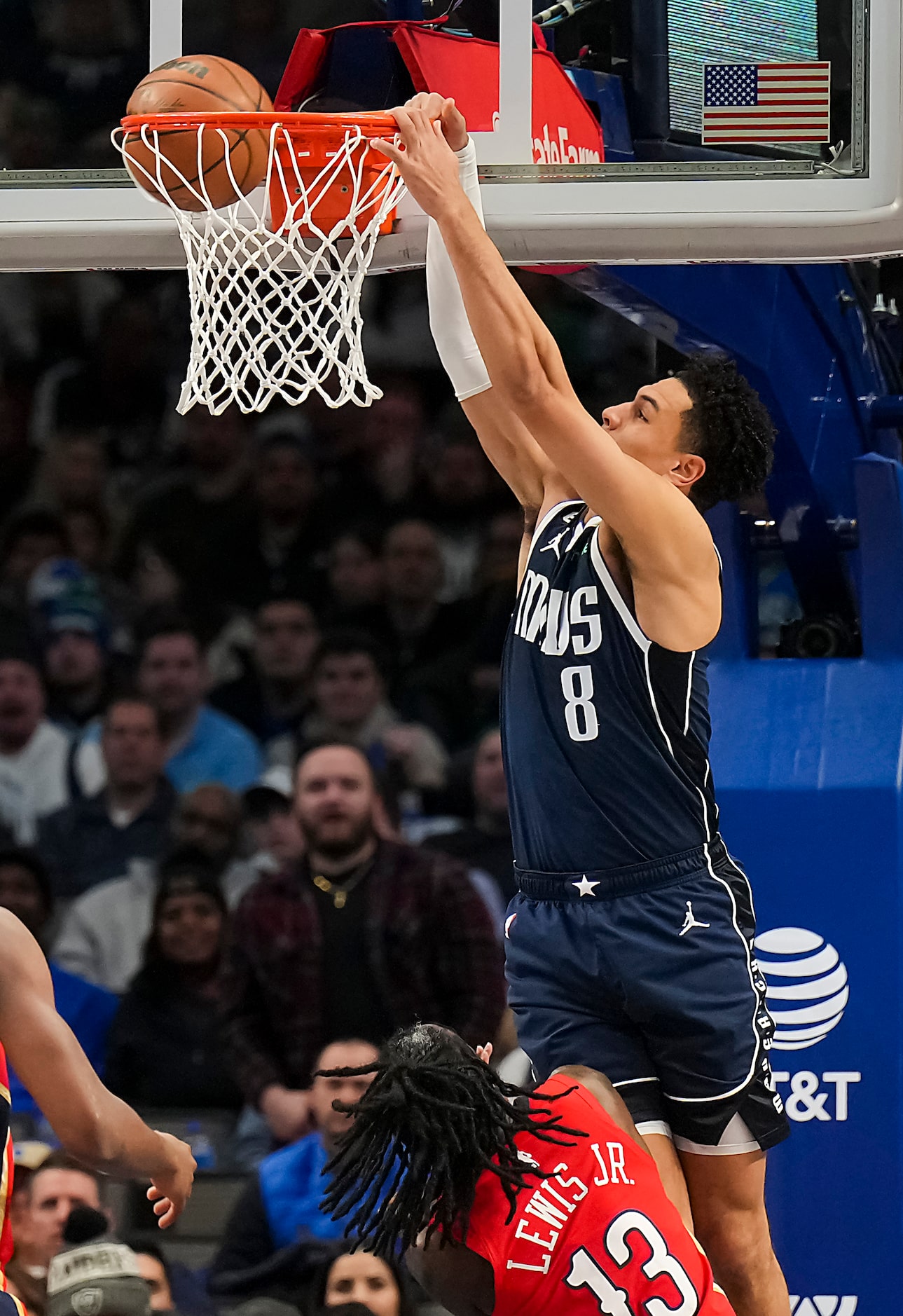 Dallas Mavericks guard Josh Green (8) dunks the ball over New Orleans Pelicans guard Kira...