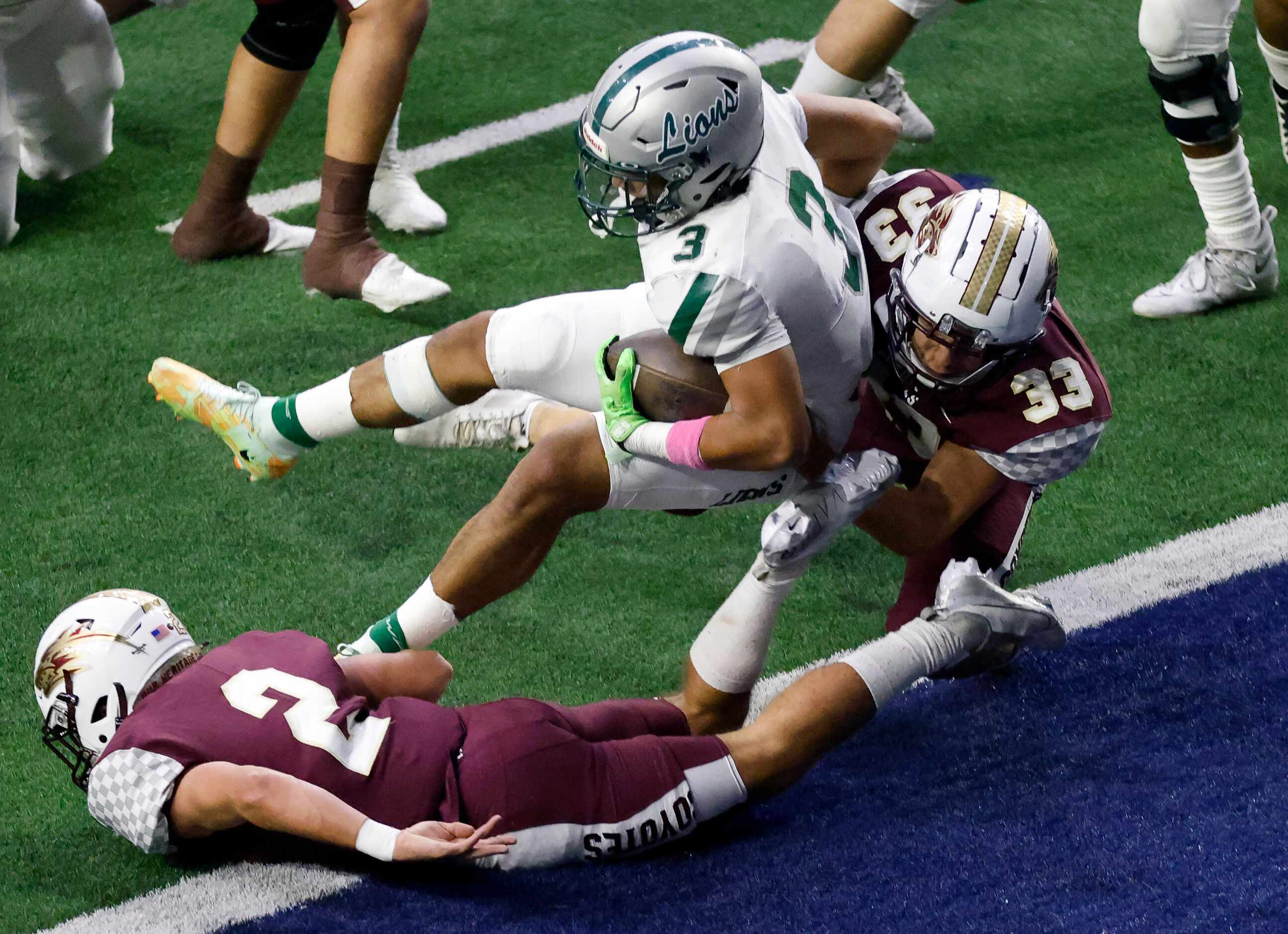 Frisco Reedy running back Dennis Moody (3) scores a first quarter touchdown despite the...