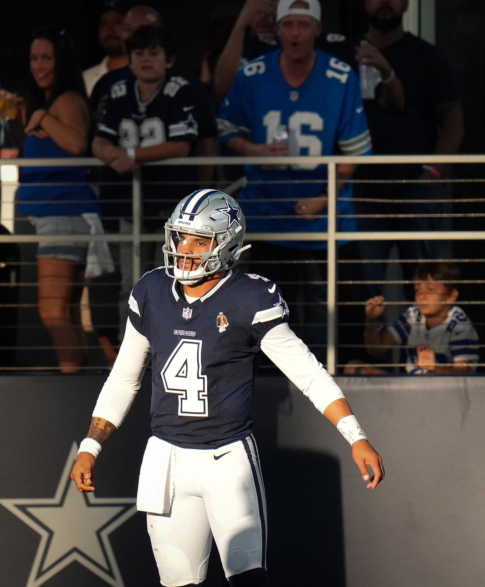 Dallas Cowboys quarterback Dak Prescott (4) reacts after throwing an interception during the...