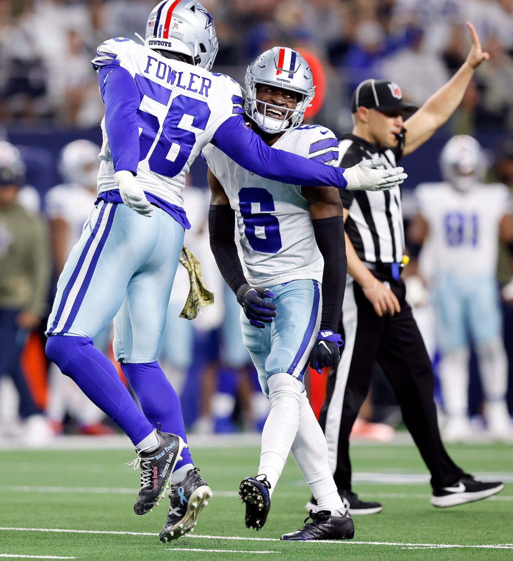 Dallas Cowboys safety Donovan Wilson (6) is congratulated by defensive end Dante Fowler Jr....