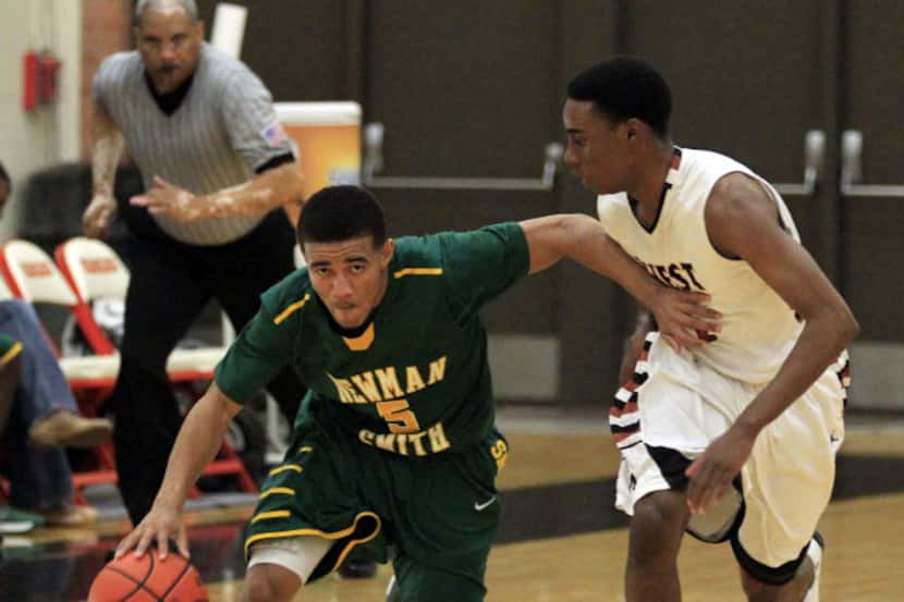 Newman Smith's Darion Brown (5) gets past West Mesquite's Jalen Etienne (1) and heads...