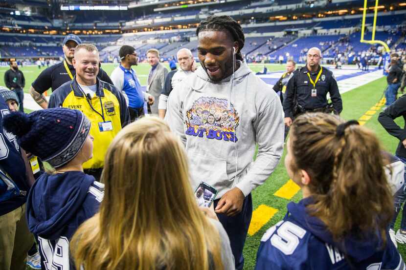 Dallas Cowboys middle linebacker Jaylon Smith (54) signs autographs before an NFL game...
