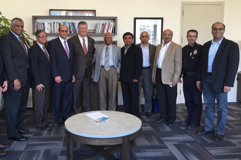 Local Indian-American leaders joined Dallas Mayor Mike Rawlings (fifth from left) and...