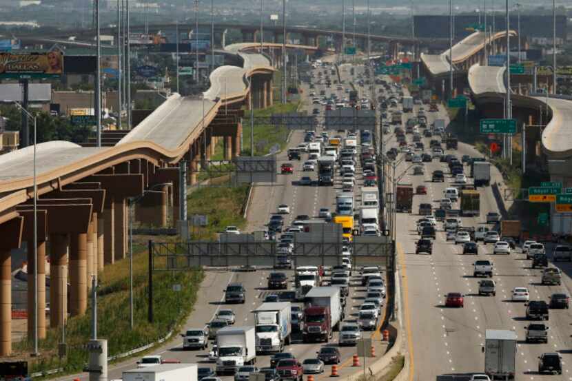 A look at I-35E just south of I-635 LBJ Freeway and the elevated toll roads that connect the...