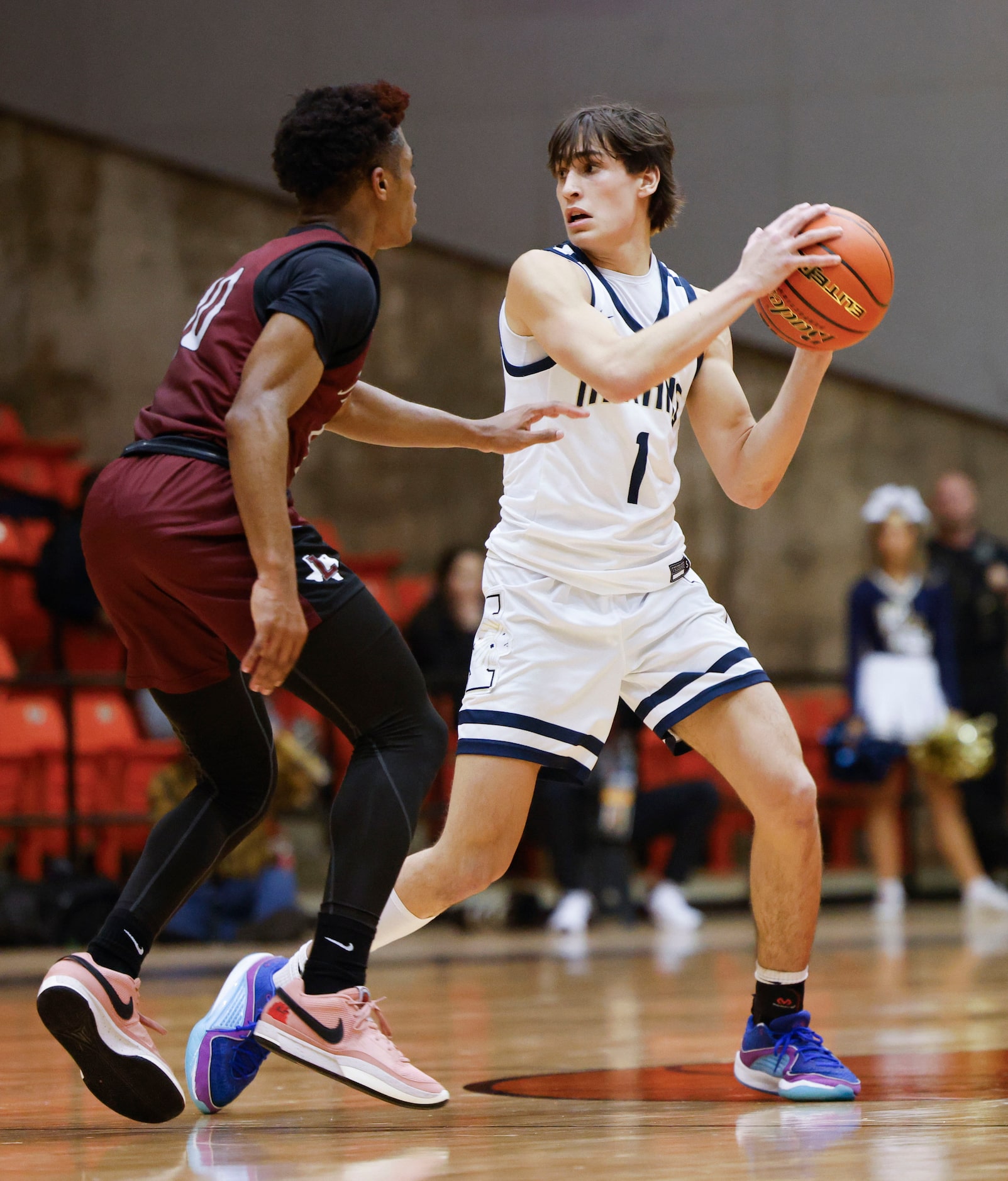 Lewisville High’s Princeton Green (left) attempts to defend against Keller high’s Luke...