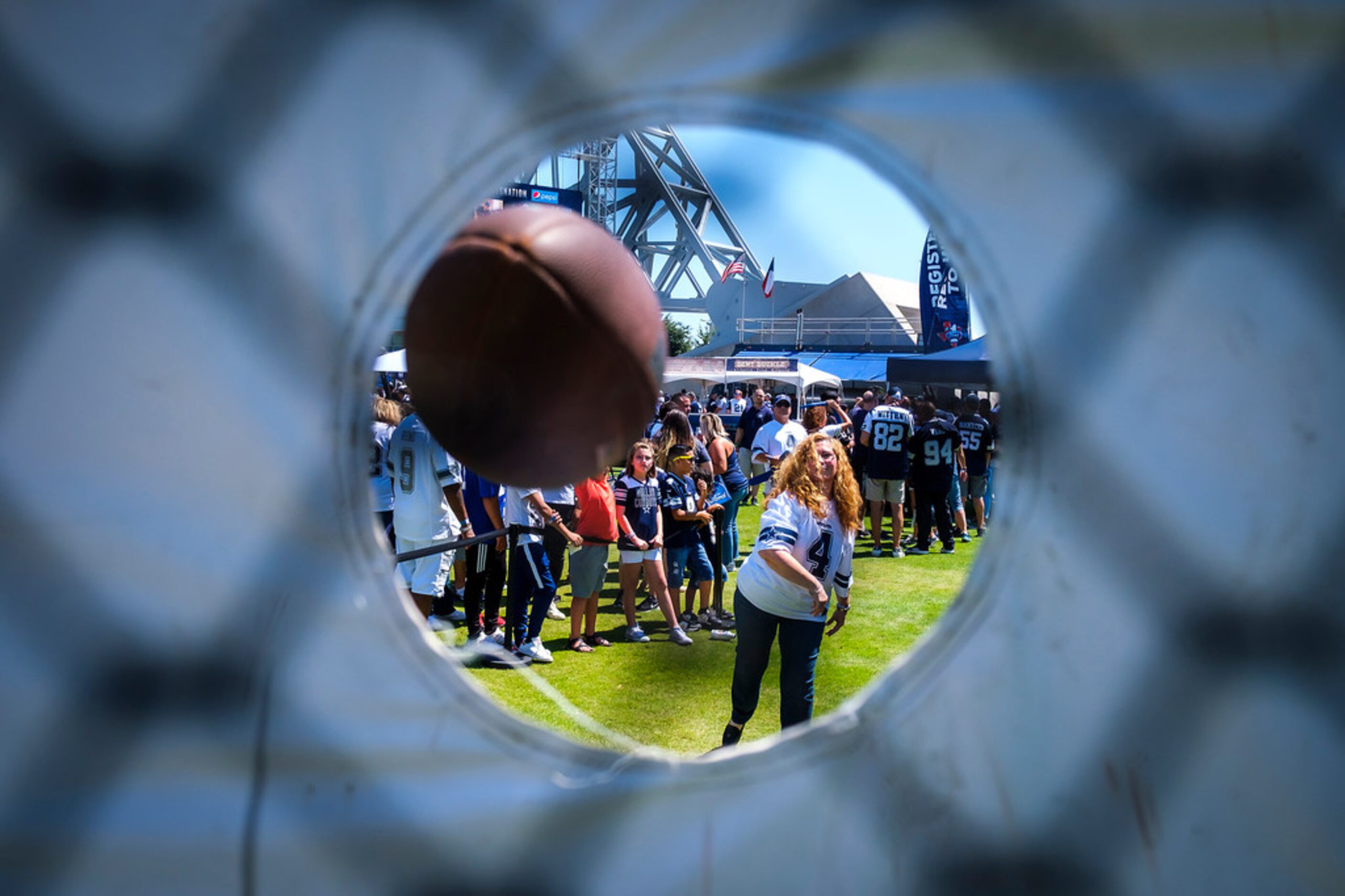 Dallas Cowboys fans play games on the Bud LIte Plaze before an NFL football game New York...