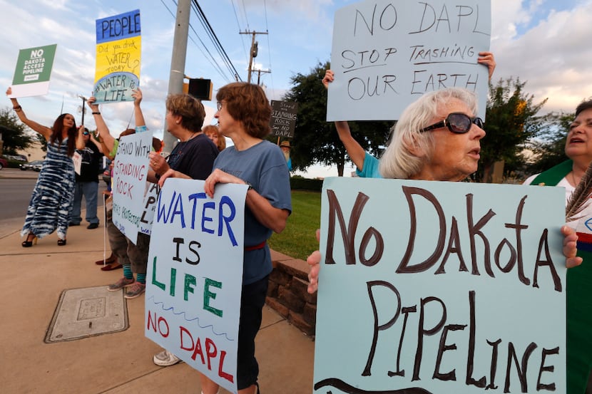 Mavis Belisle (right) joins other protesters during a National Day of Action against the...