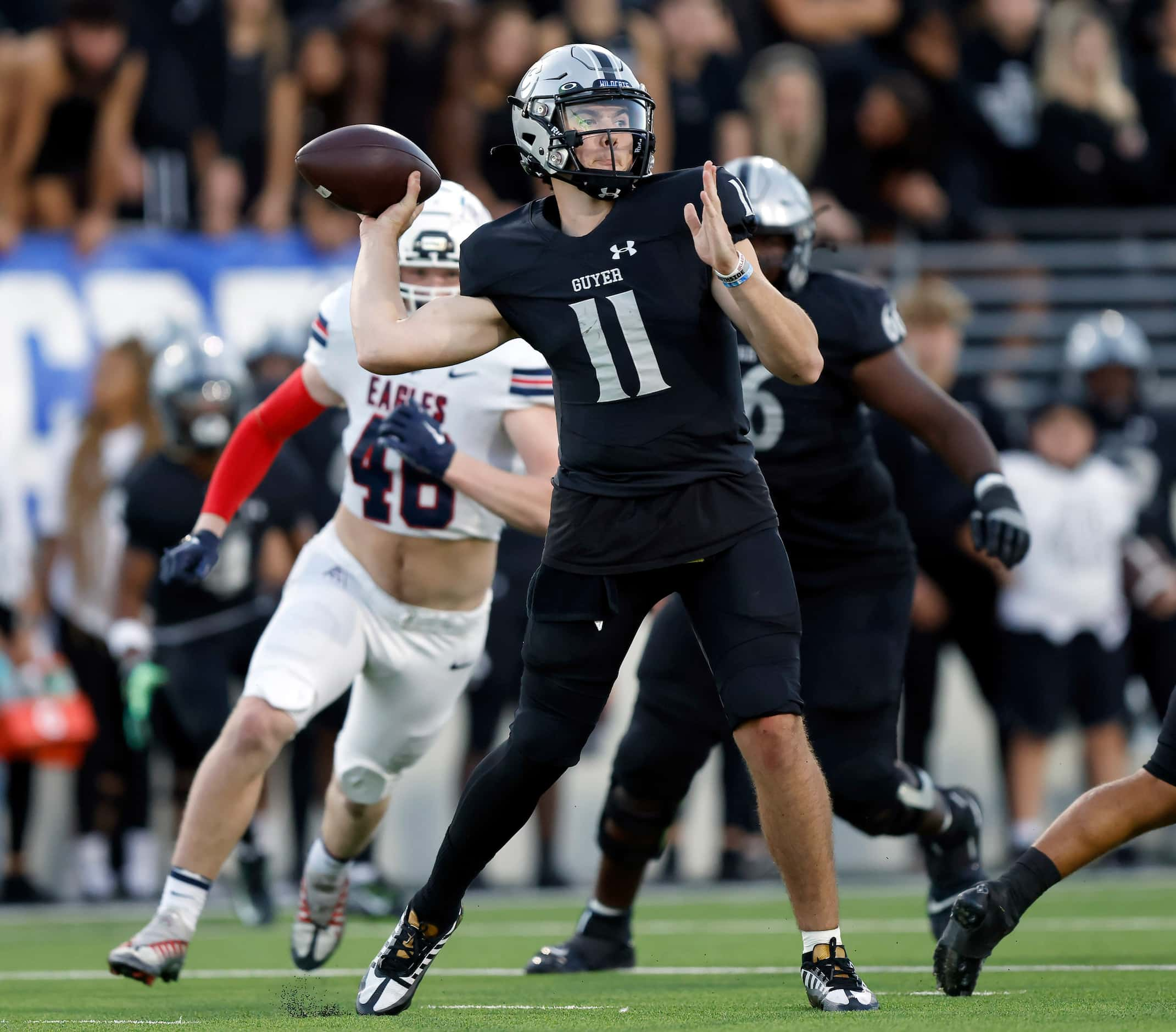 Denton Guyer quarterback Jackson Arniold throws a second quarter pass against Allen at C.H....