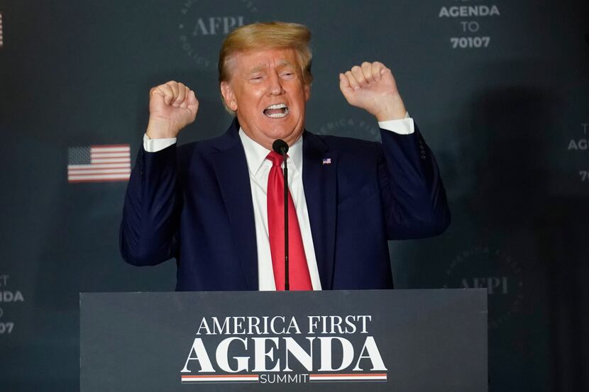 Former President Donald Trump talks about lifting weights as he speaks at an America First...