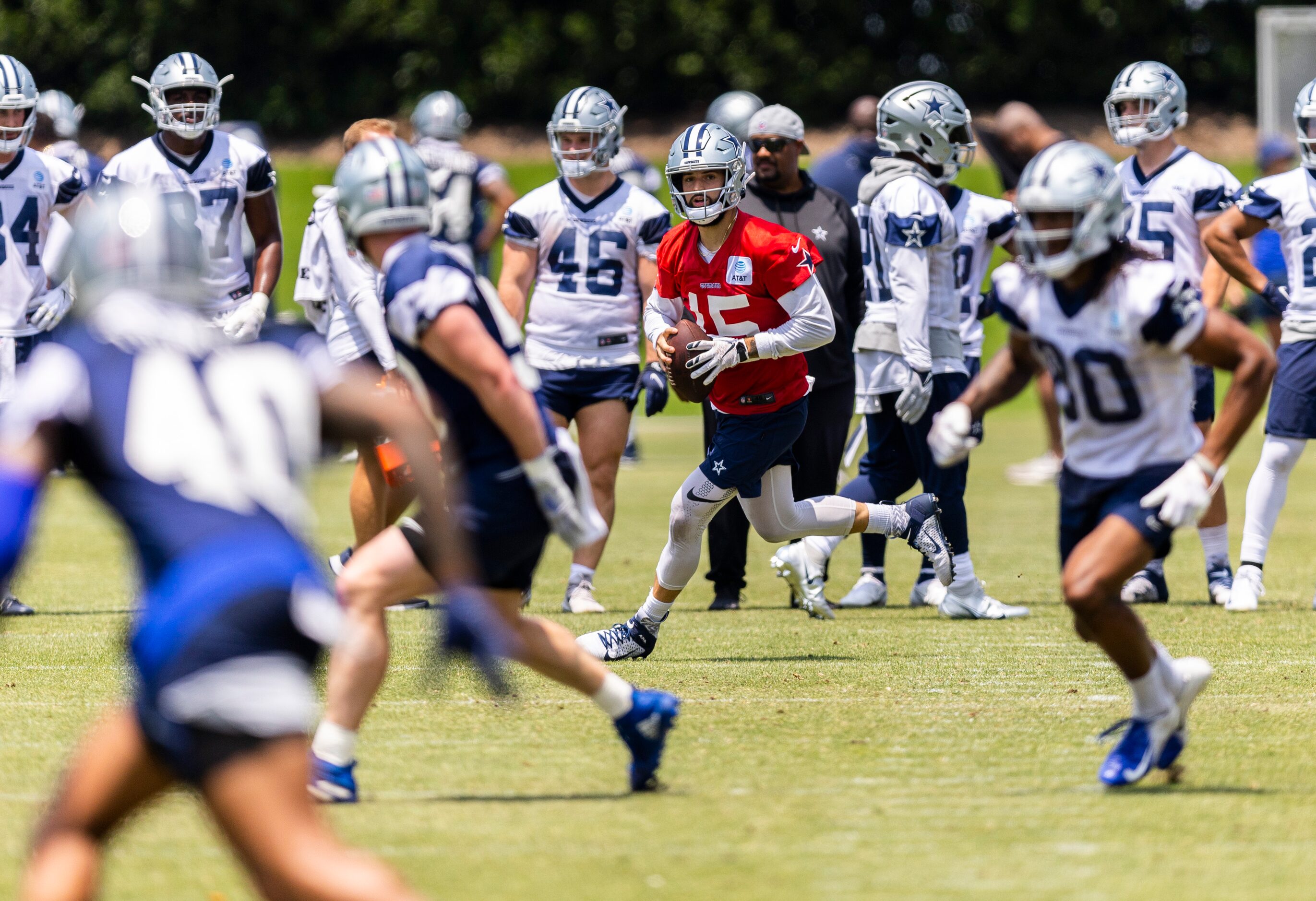 Dallas Cowboys quarterback Will Grier (15) looks for an open receiver during practice at The...