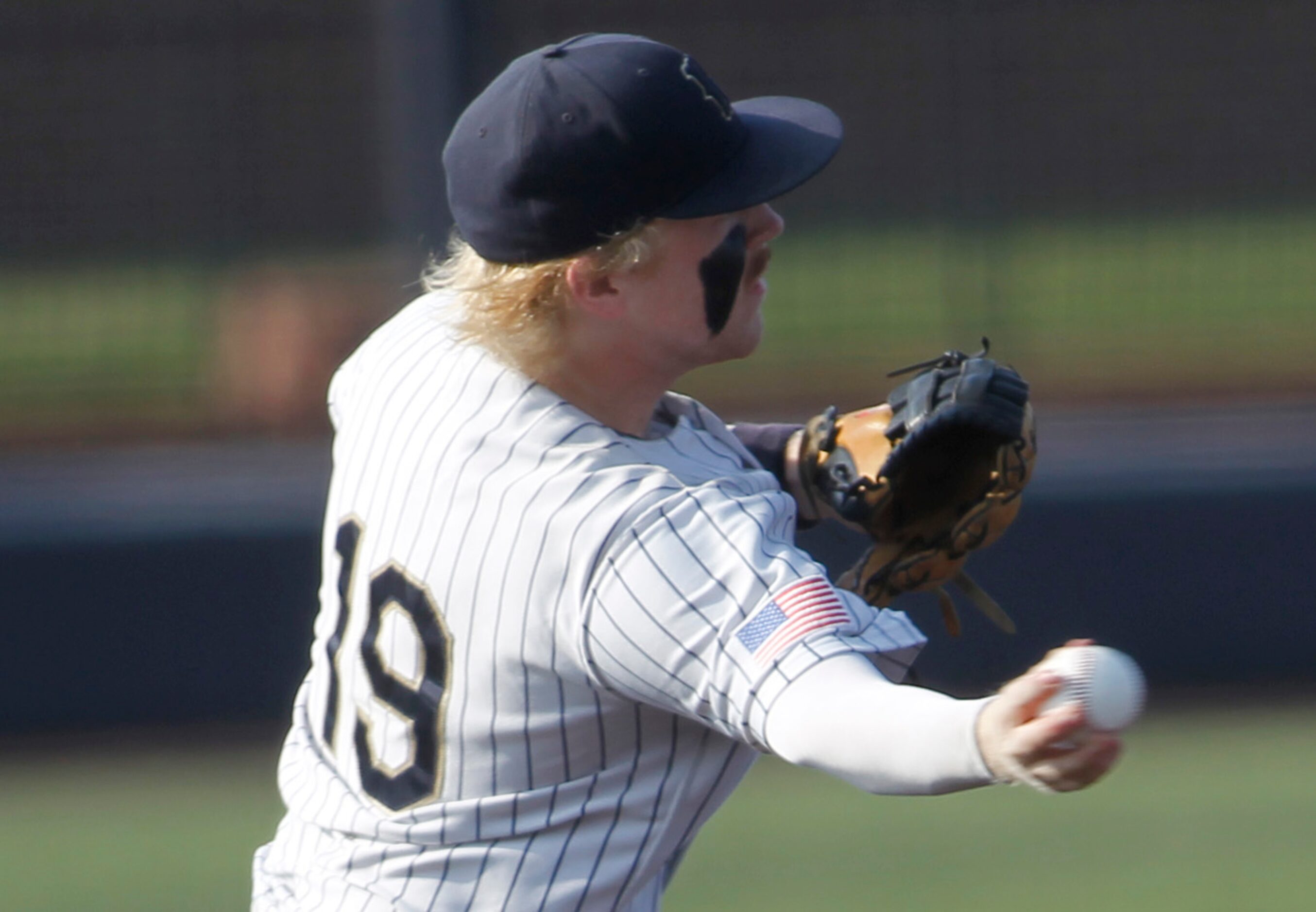 Keller third baseman Fisher Polydoroff (19) fields a grounder and forces a Flower Mound...