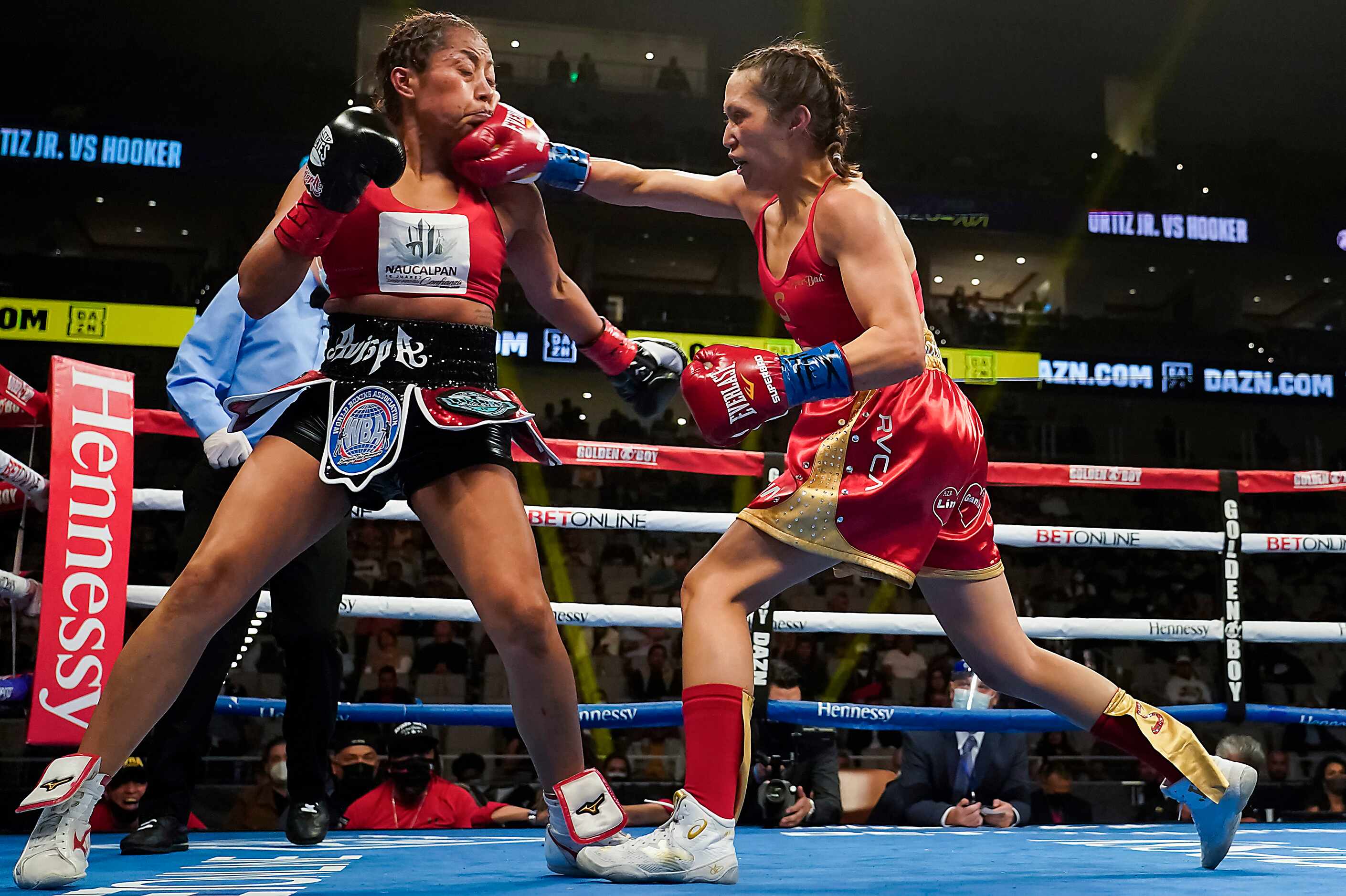 Seniesa Estrada lands a punch to the face of Anabel Ortiz as they fight for the WBA women’s...