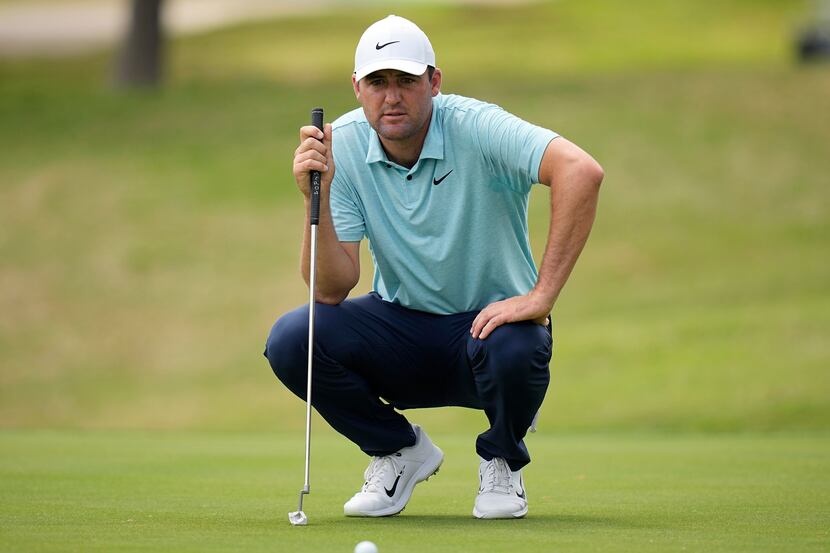Scottie Scheffler lines up his putt on the fifth hole during the second round of the Dell...