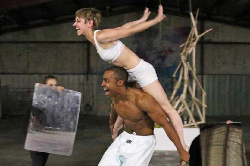 
Members of PrismCo, including Katy Tye (top) perform a scene from the “Darkness” segment of...