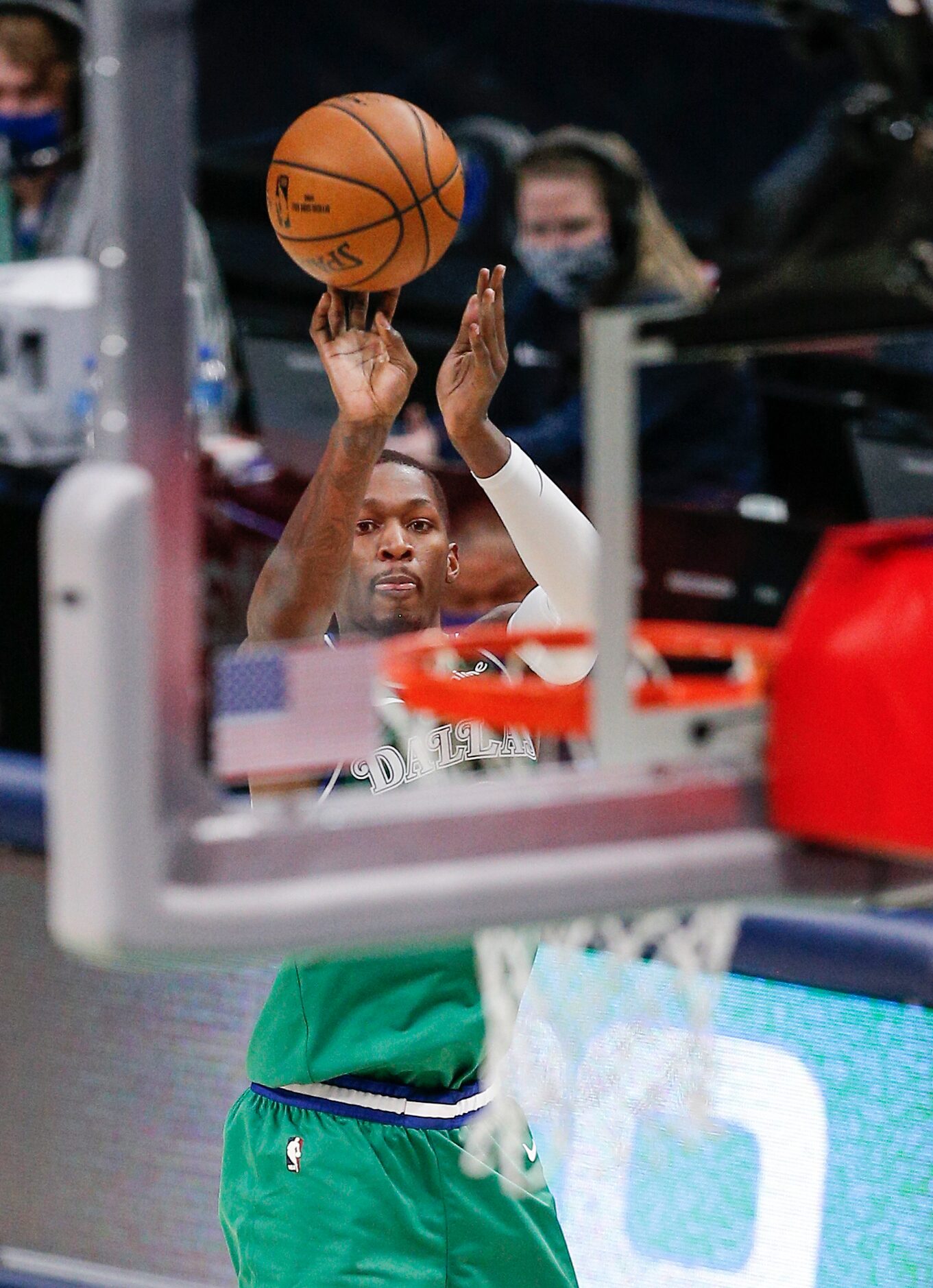 Dallas Mavericks forward Dorian Finney-Smith (10) attempts a shot during the second half of...