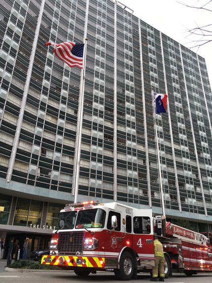 Firefighters had to break out a window to vent smoke from the building on Commerce Street.