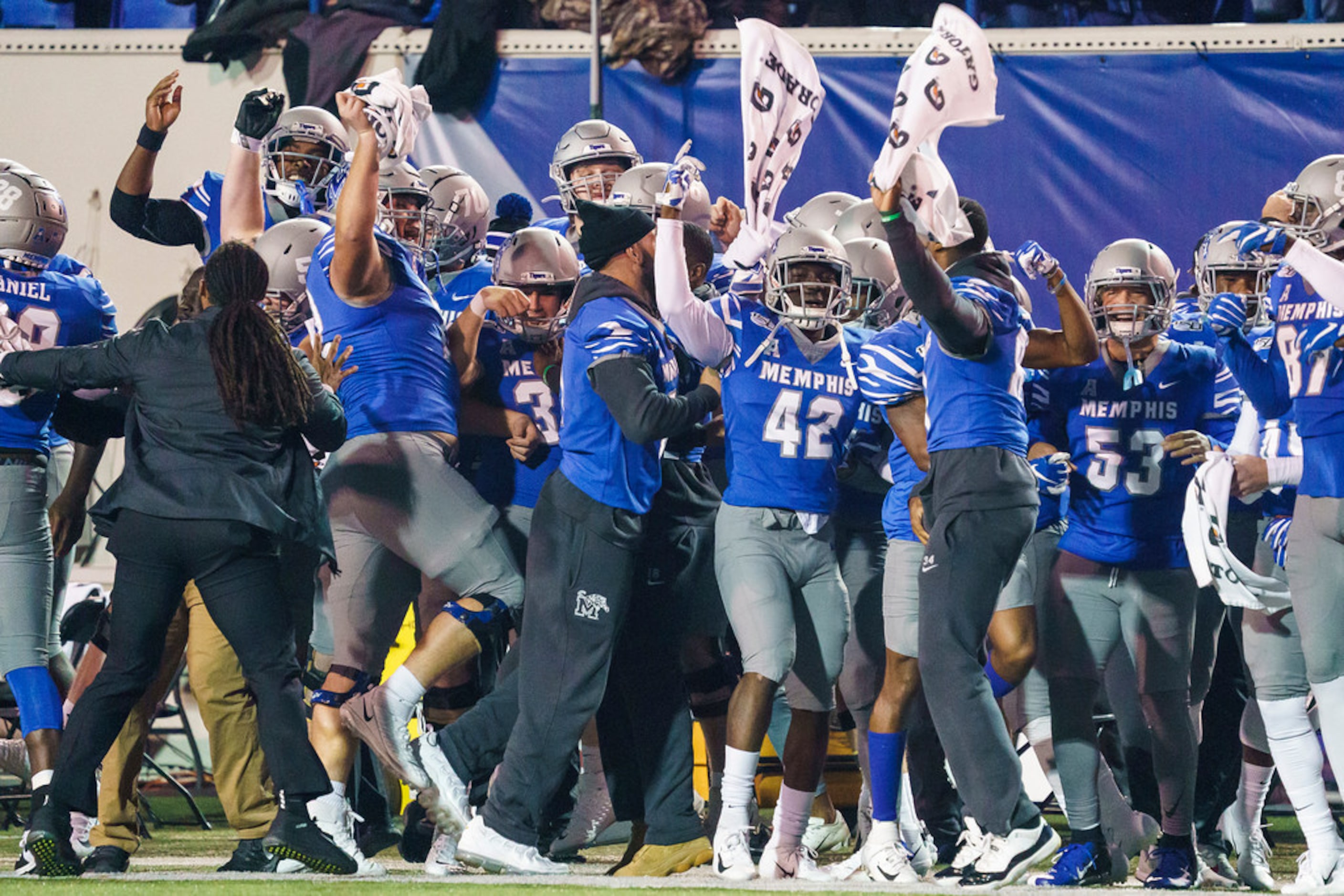 Memphis players whoop it up before the opening kickoff of an NCAA football game against SMU...