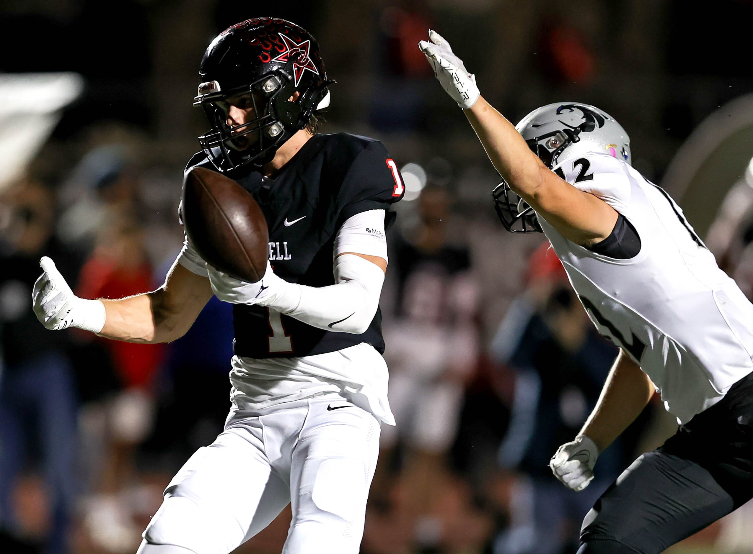 Coppell wide receiver Baron Tipton (1) can't come up with the catch against Denton Guyer...