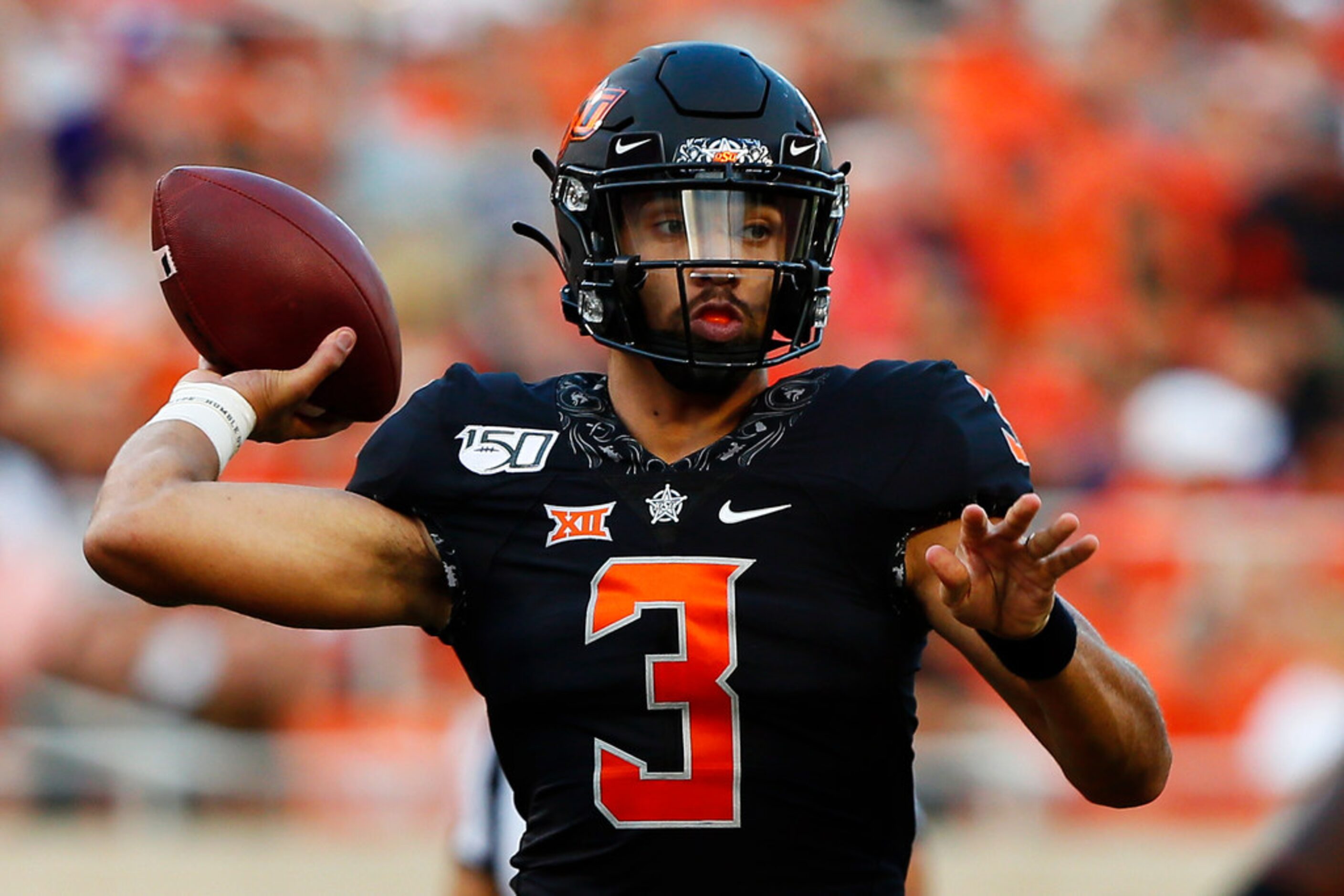 STILLWATER, OK - SEPTEMBER 28:  Quarterback Spencer Sanders #3 of the Oklahoma State Cowboys...