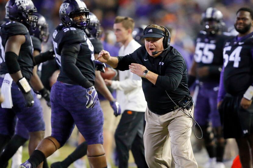 FILE - TCU Horned Frogs head coach Gary Patterson yells at one of his players during the...
