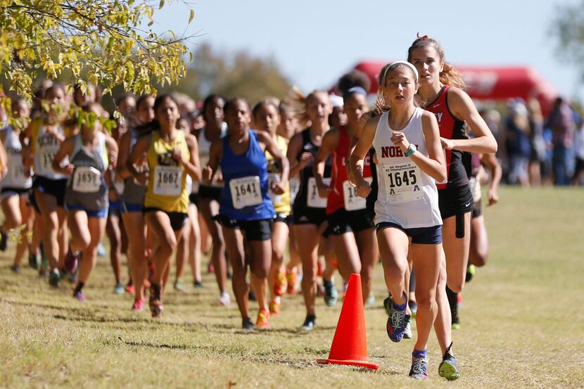 McKinney North's London Culbreath (1645) leads the pack in the 5K of the Class 5A girls UIL...