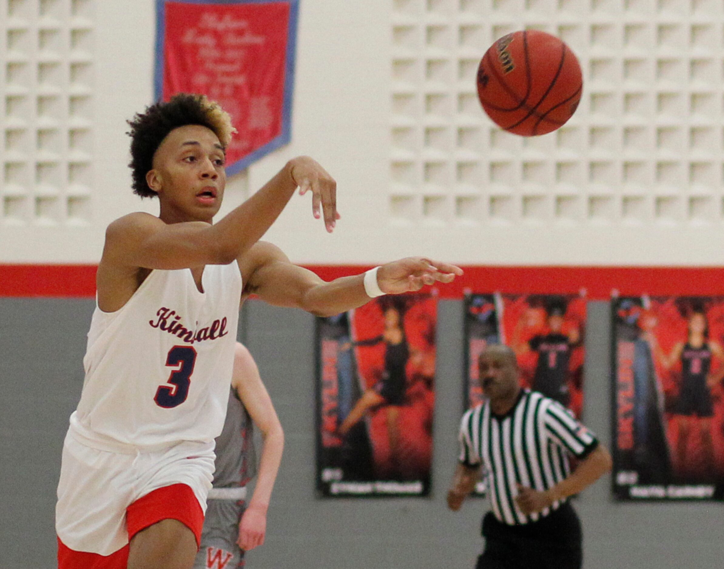 Dallas Kimball guard Chauncey Gibson (3) launches a cross-court pass during second half...