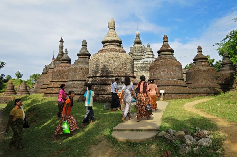 Locals regularly worship at the stupas in Mrauk U, Myanmar.