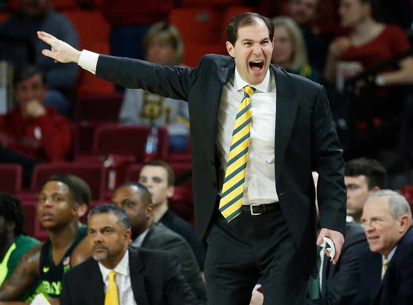 Baylor head coach Scott Drew shouts in the second half of an NCAA college basketball game...