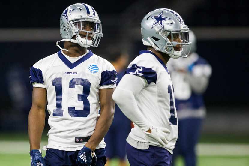 Dallas Cowboys wide receiver Michael Gallup (13) stands with wide receiver Randall Cobb (18)...