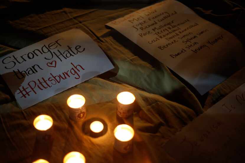 The names of victims of a deadly shooting at a Pittsburgh synagogue were placed next to...
