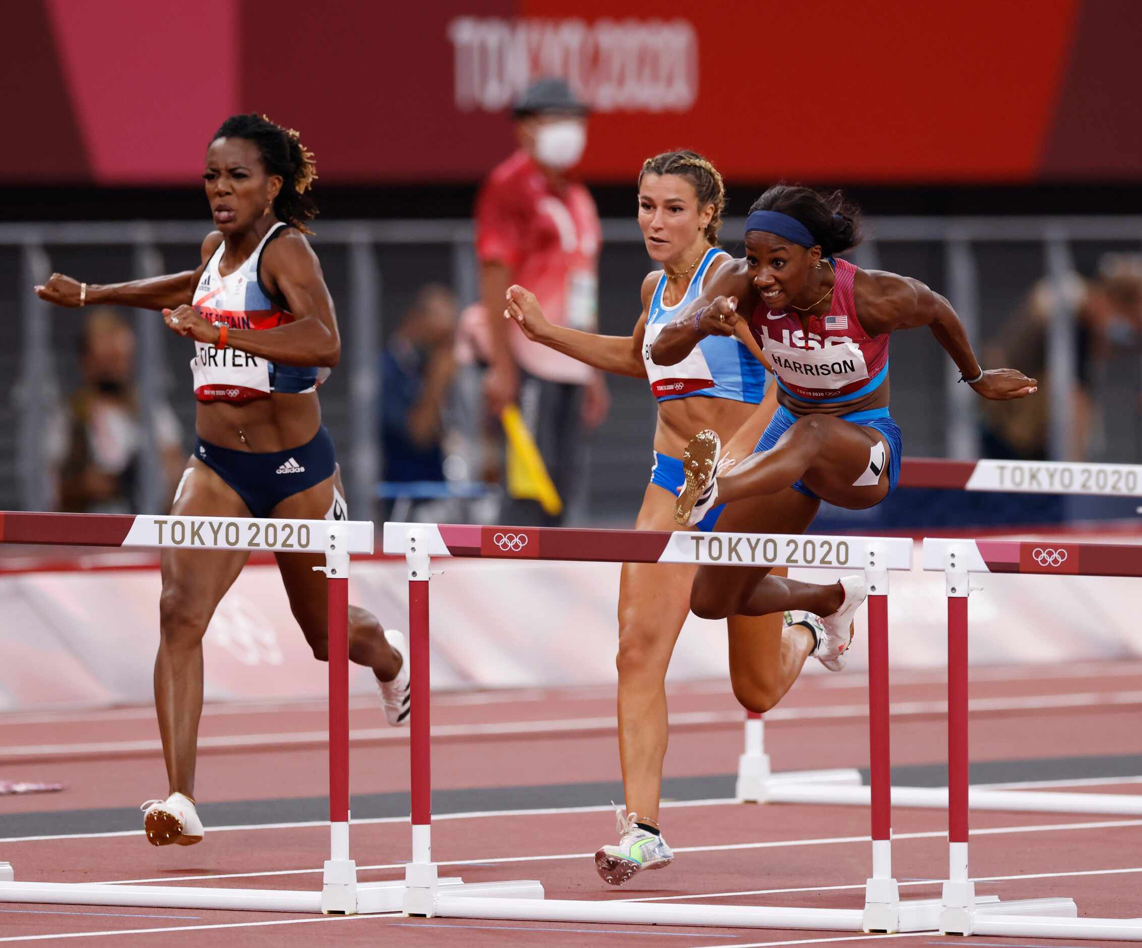 USA’s Kendra Harrison runs in the women’s 100 meter hurdles semifinal during the postponed...