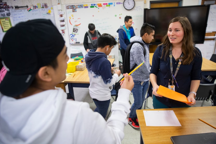 Autumn Slosser (right), a Thomas Jefferson High School ESL teacher, in the classroom on Feb....