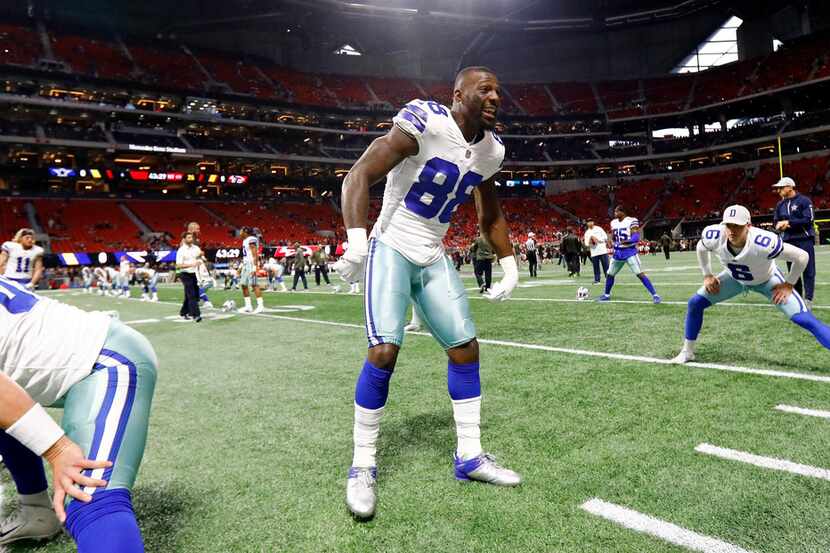 Dallas Cowboys wide receiver Dez Bryant (88)] gets fired up by yelling Zeke's name before...