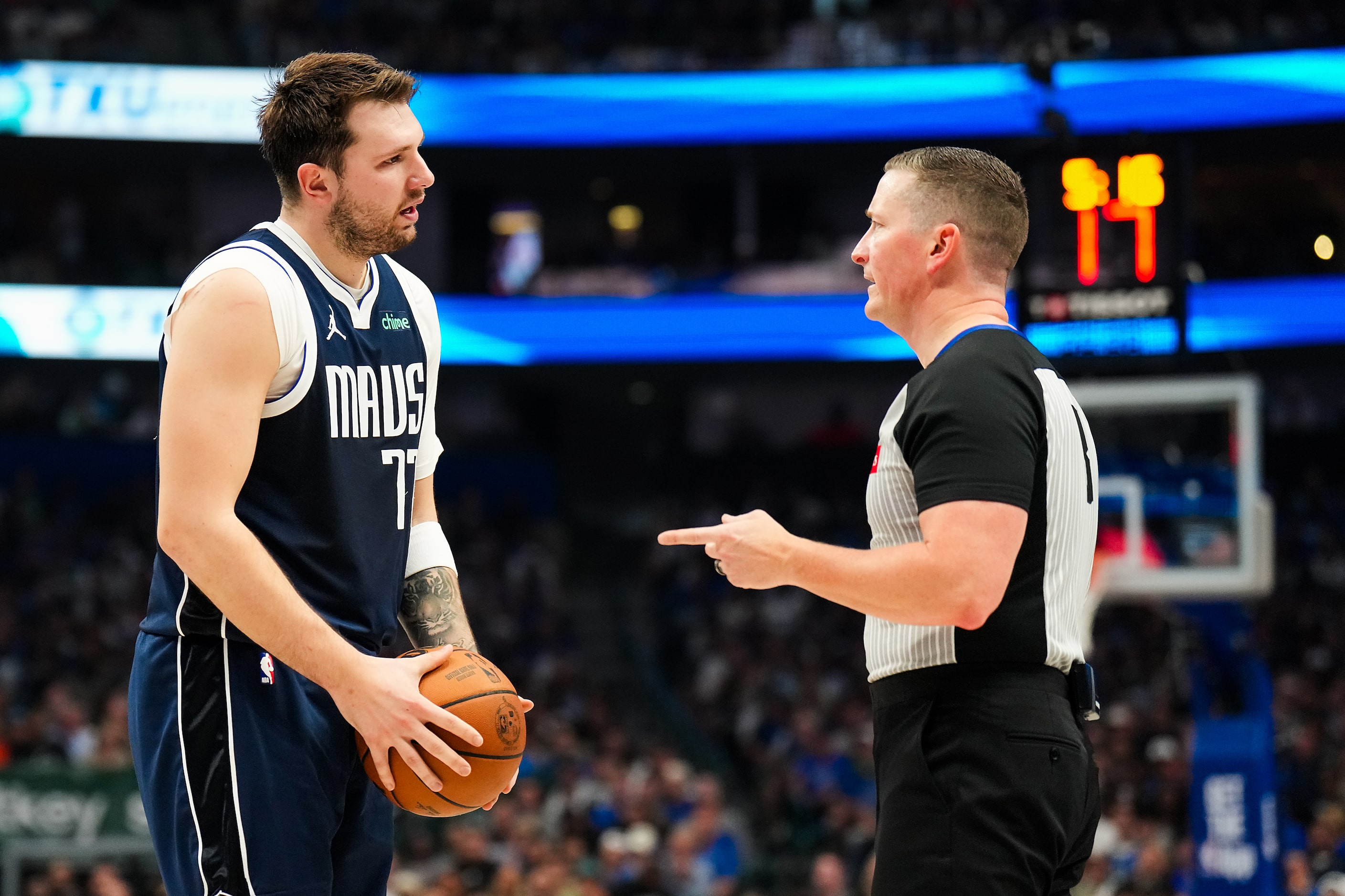 Dallas Mavericks guard Luka Doncic (77) looks for a call from a referee during the first...