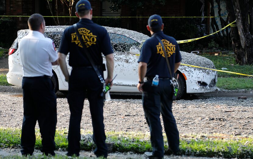 Members Plano Fire-Rescue work at the scene of a home explosion Monday.