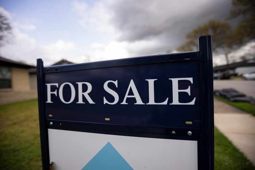 A “FOR SALE” sign outside of a home on Friday, March 8, 2024, in the Casa View neighborhood...