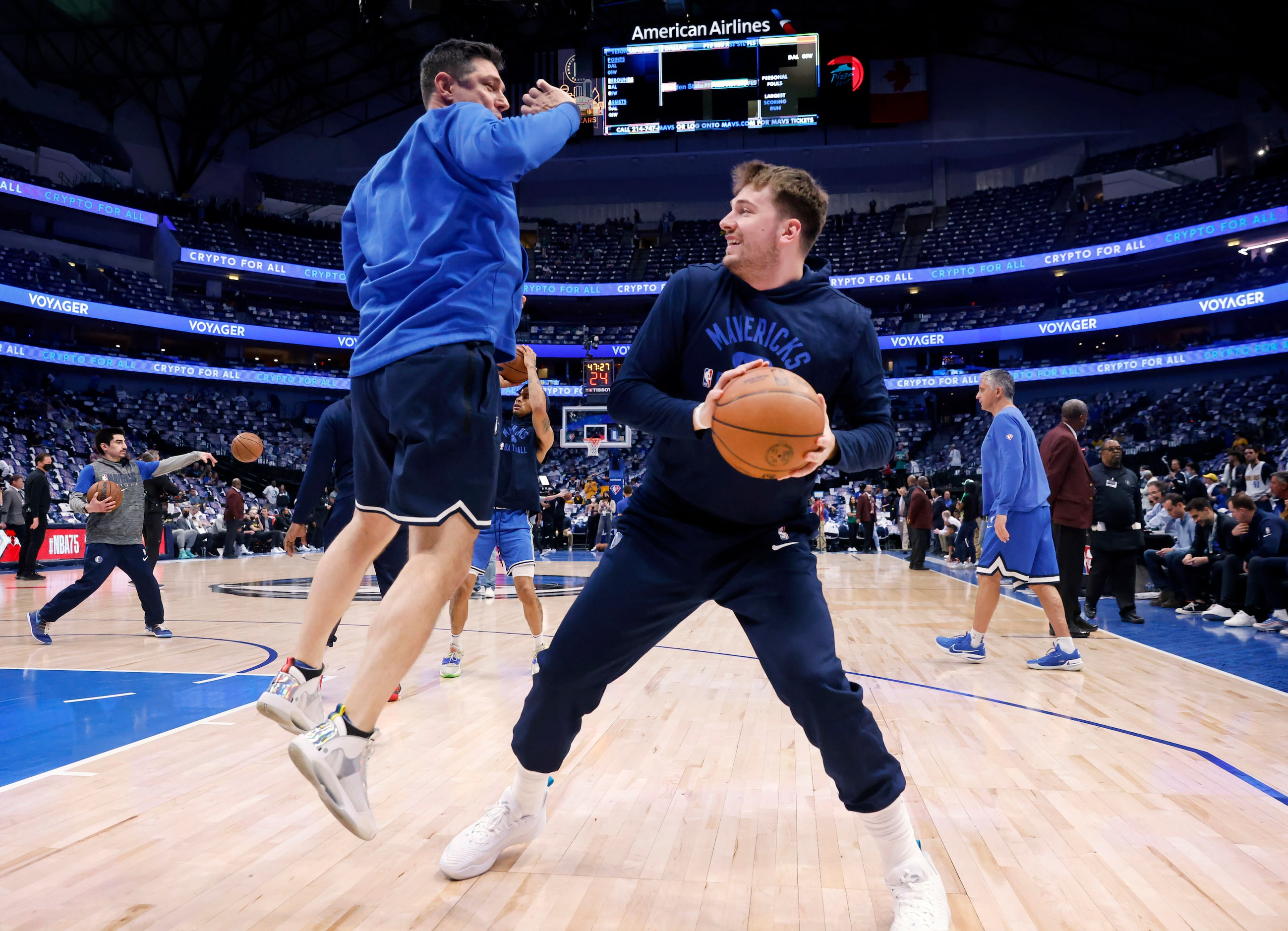 Dallas Mavericks guard Luka Doncic (77) warms up before Game 3 of the NBA Western Conference...