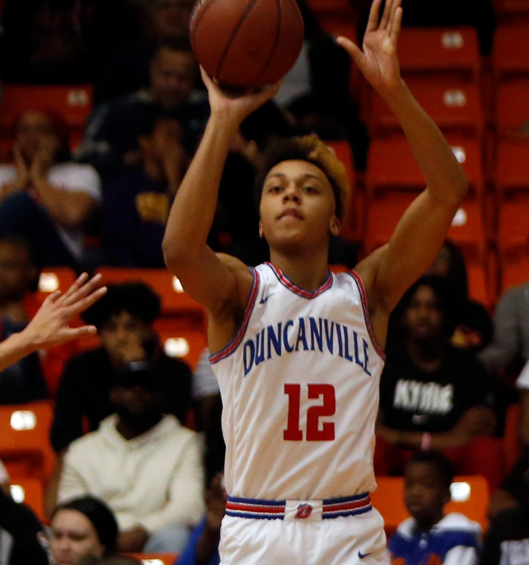 Duncanville Panthers guard Chauncy Gibson (12) sinks a 3-pointer during second half action...