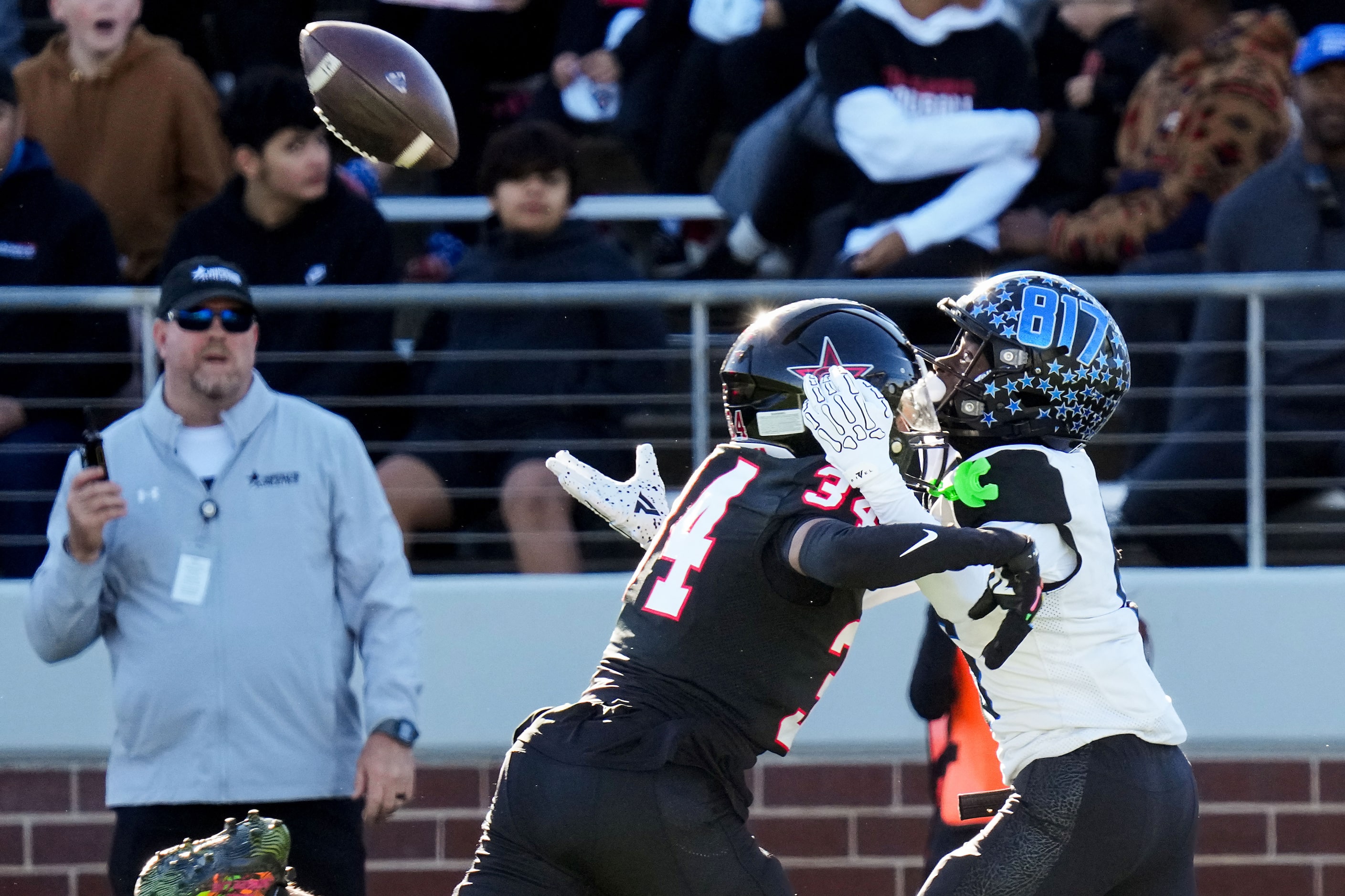 Coppell defensive back Tyrell Roberson (34) commits a pass interference penalty on a pass...