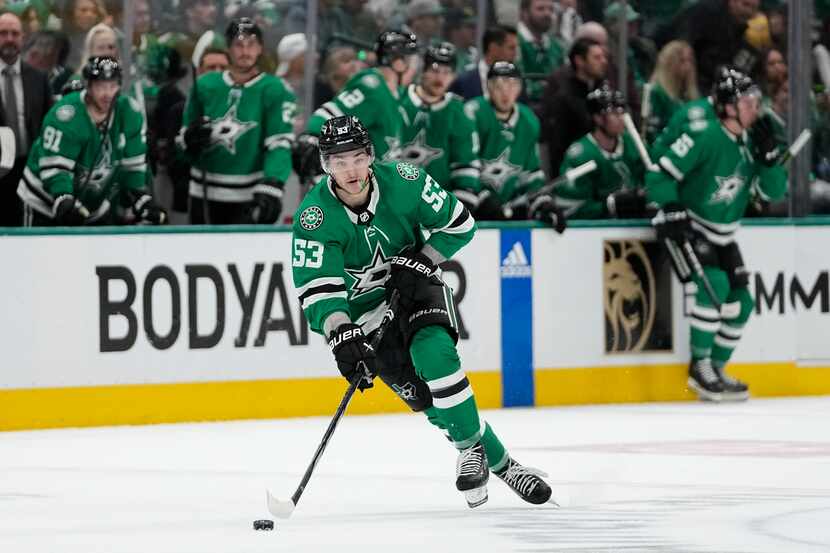 Dallas Stars center Wyatt Johnston skates with the puck against the Vegas Golden Knights...